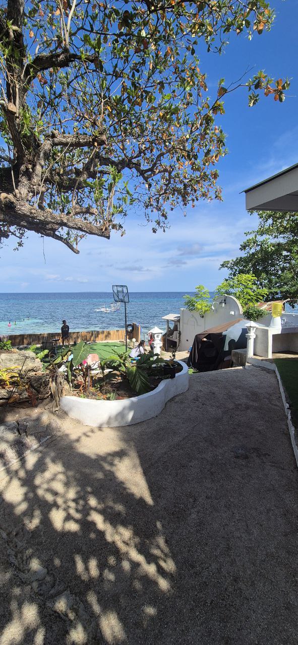Beachfront path and sea view at Paradise Villa Panglao